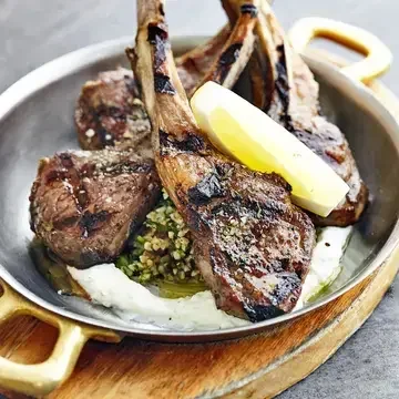 Paidákia (lamb chops) at Mamakas in Toronto.