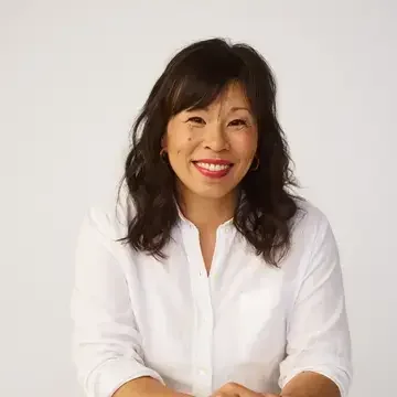 Journalist Pay Chen in a white shirt.
