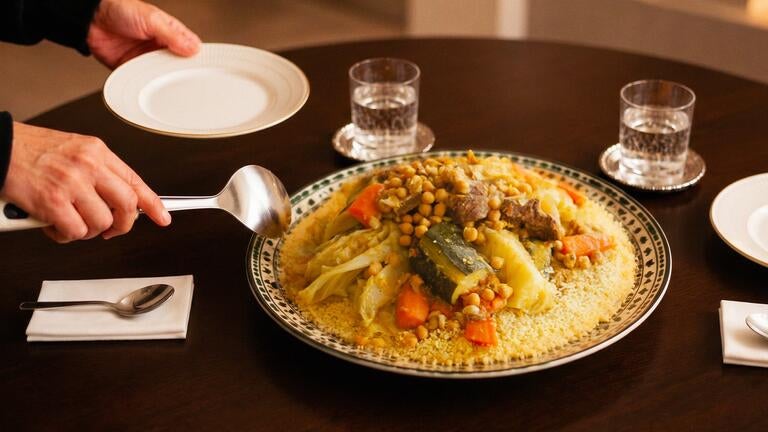Serving couscous with vegetables.
