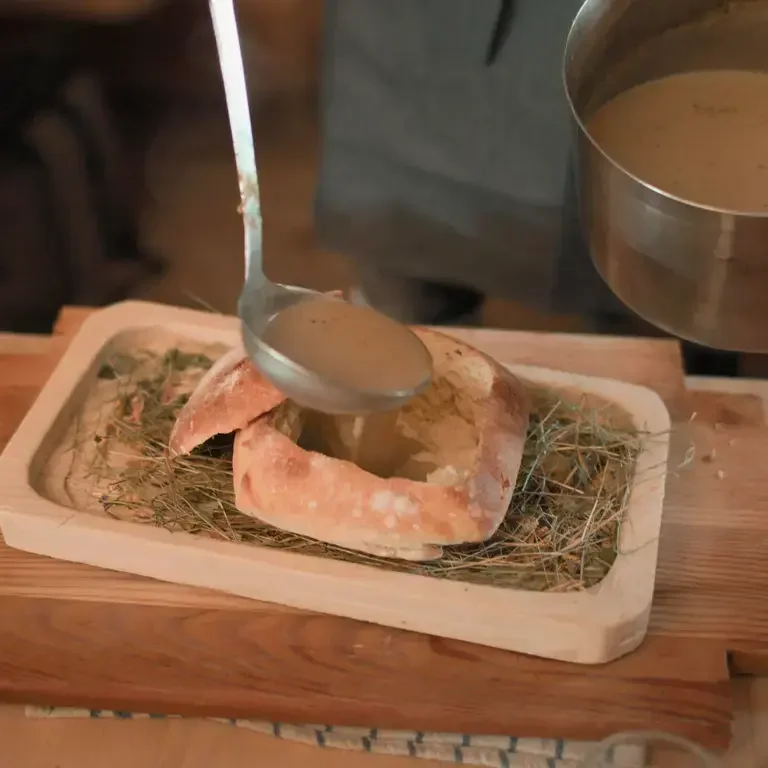 hay soup in a loaf of homemade bread