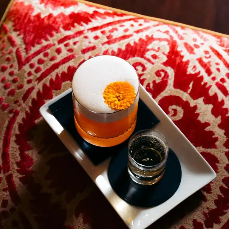 Cocktail on a tray at Lobby Bar.