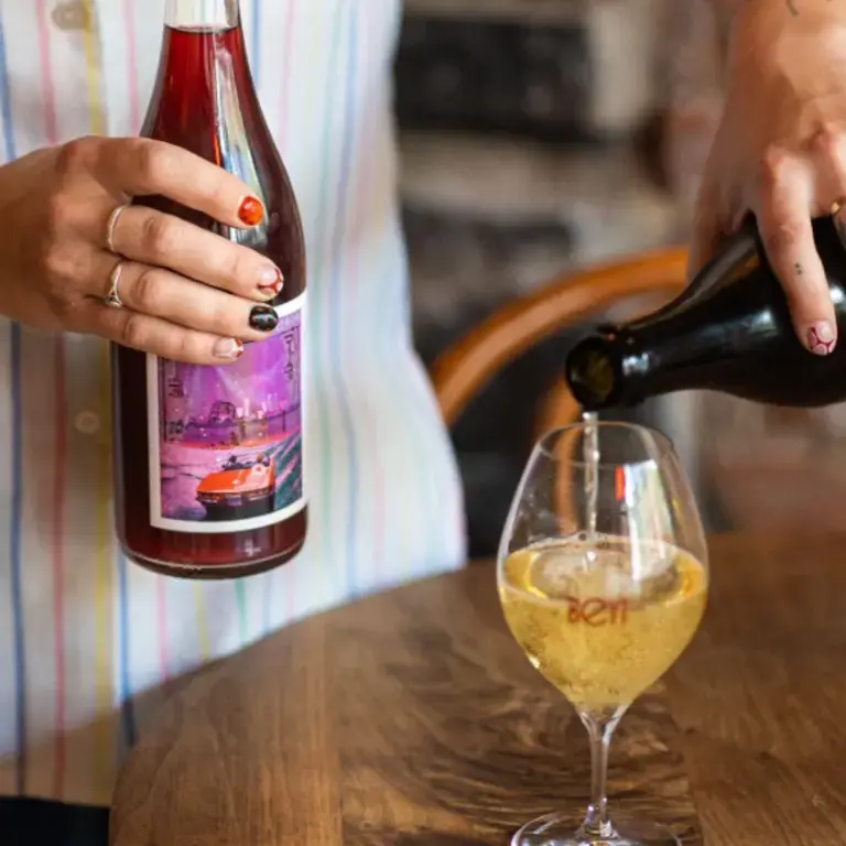 Pouring wine at Beyt Cave à Manger.