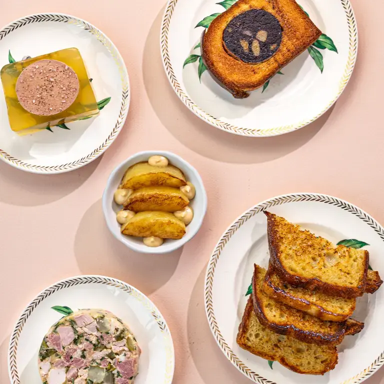 Spread of dishes at Brasserie Marguerite in Montréal.