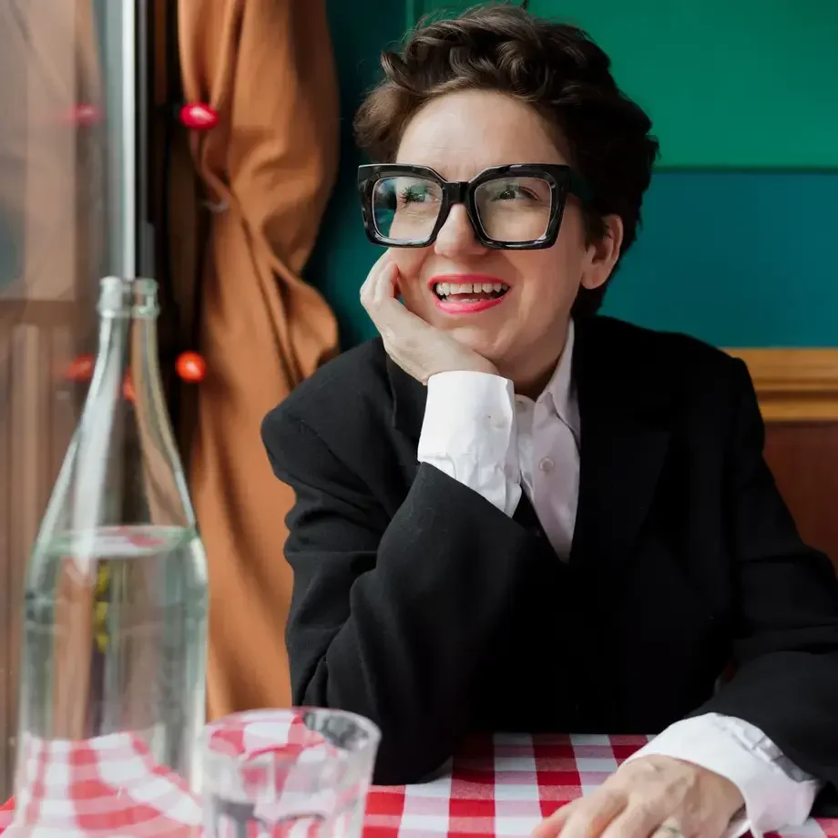 Food journalist Ivy Knight sat at a restaurant table.