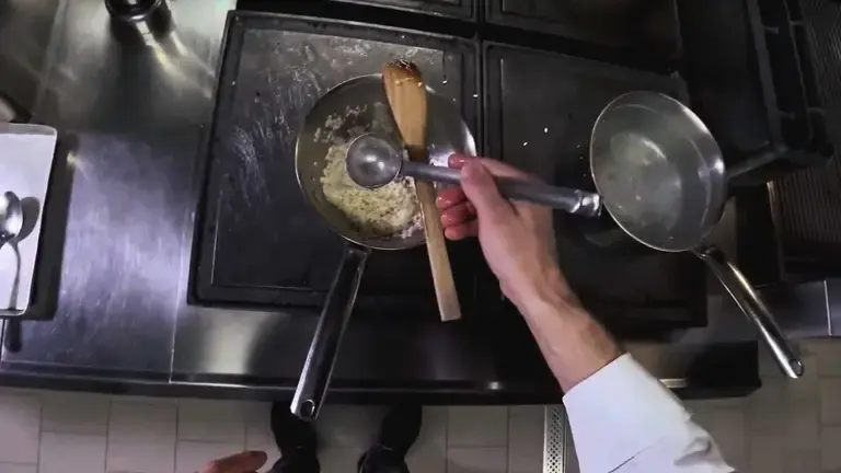 adding hot water to the rice