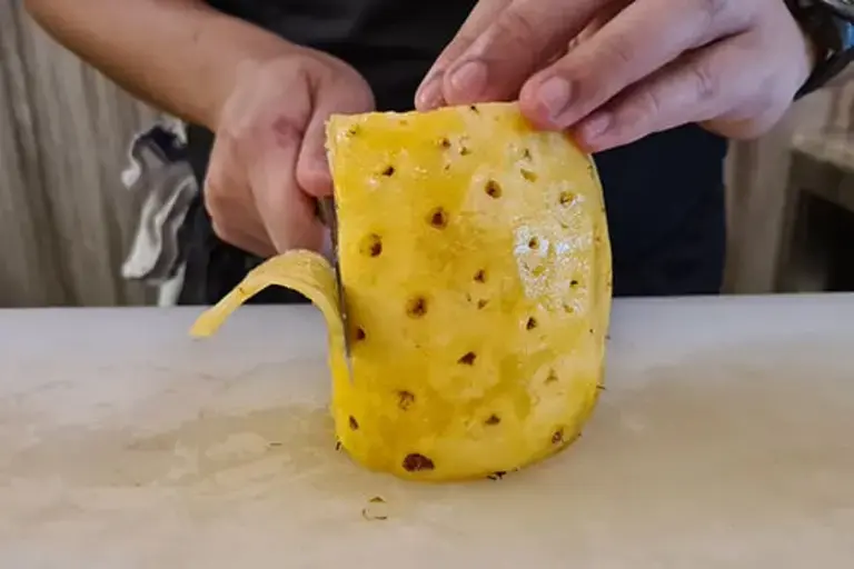 Slice pineapple