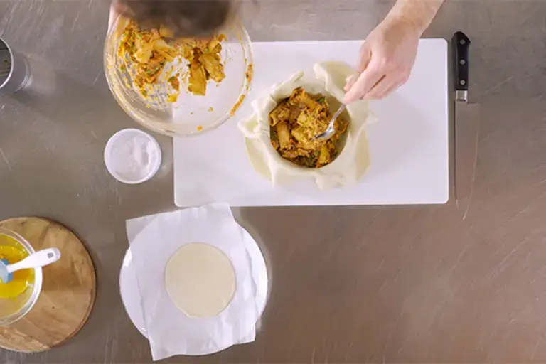 A pie being filled.
