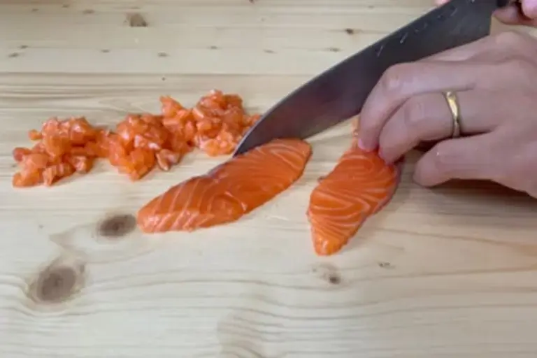 cutting the trout Courtesy of Chef Mengxin Zhou